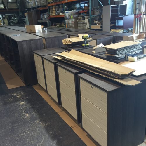 A warehouse with many different types of filing cabinets.